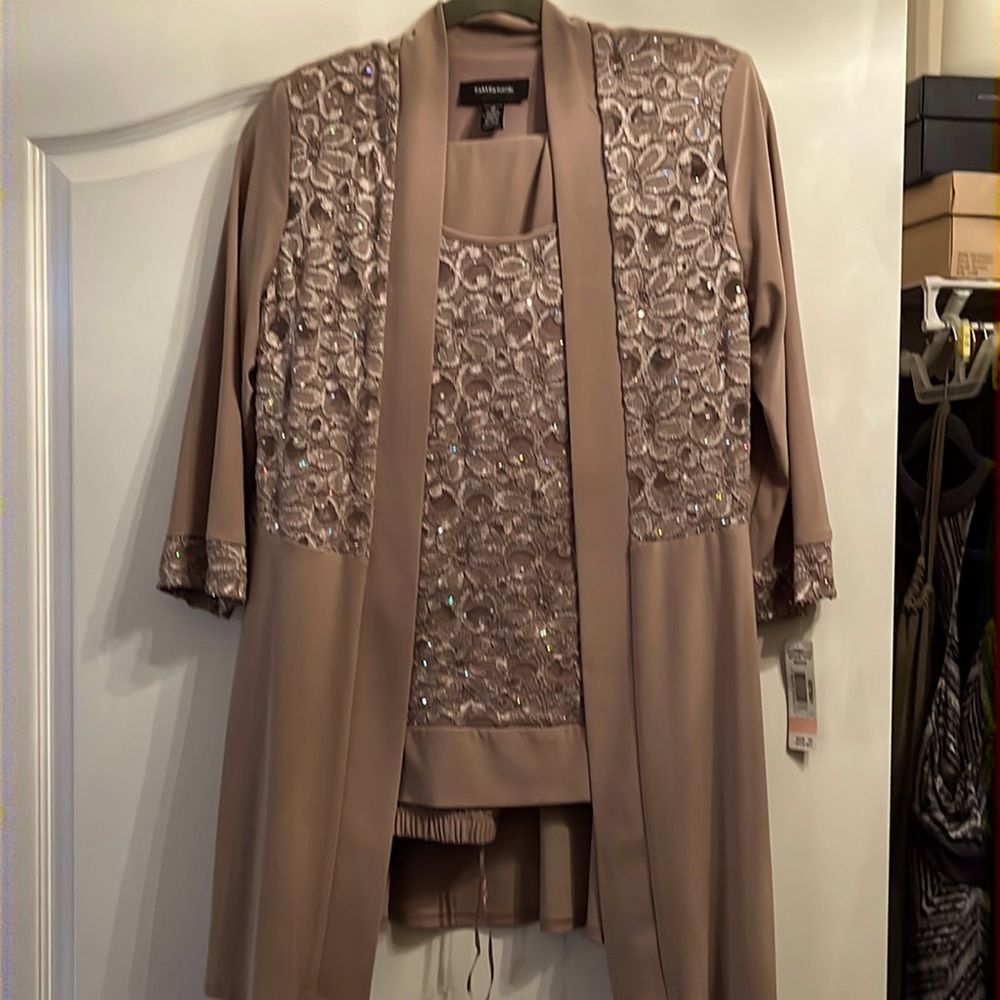 Beautiful two piece pantsuit tank top attached to jacket with embellishments